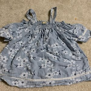 Cold shoulder floral top.